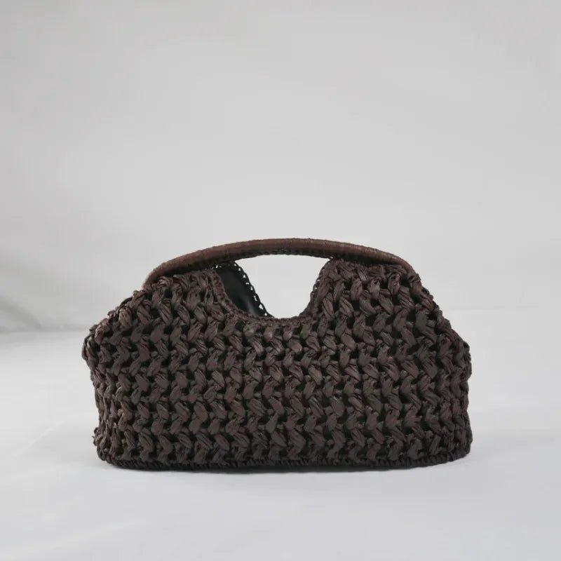 Celeste Clutch aus geflochtenem Stroh in Muschelform