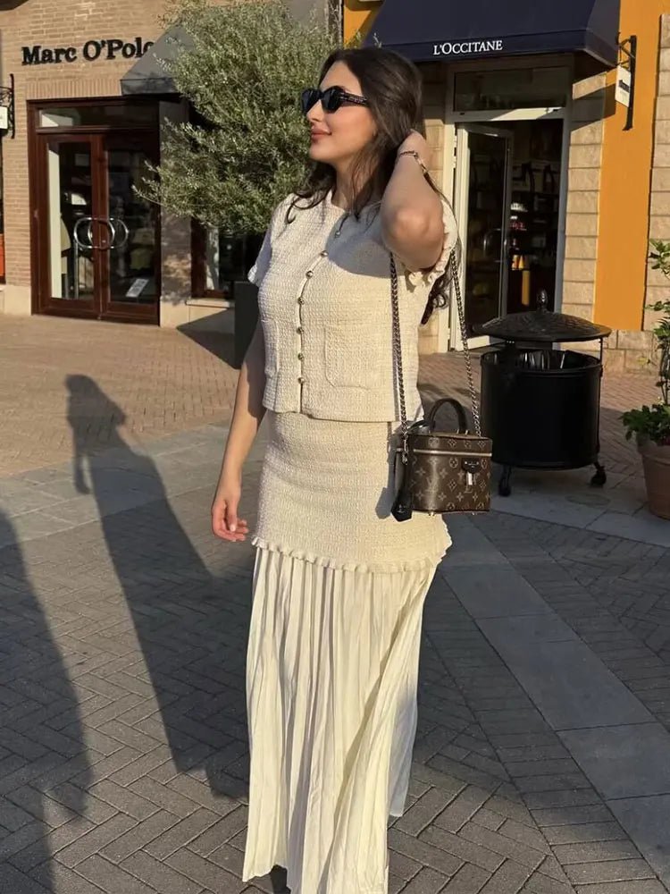 Claudia Set aus Stricktop und Plisseerock