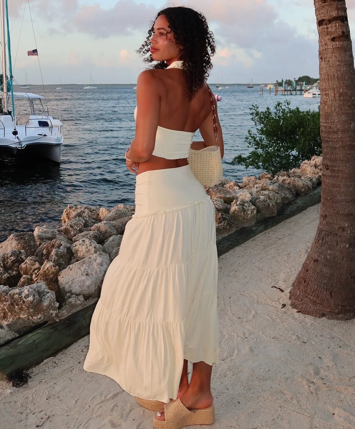 Jane Set aus Neckholder-Crop-Top und plissiertem Rock