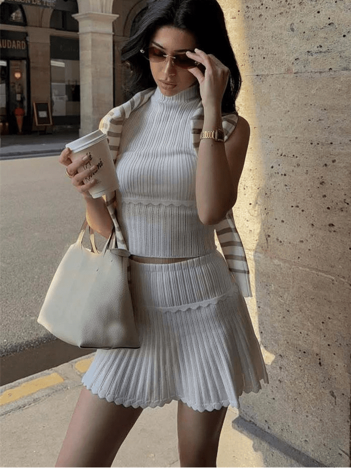Kelly zweiteiliges Set aus gestricktem Crop-Top und plissiertem Minirock