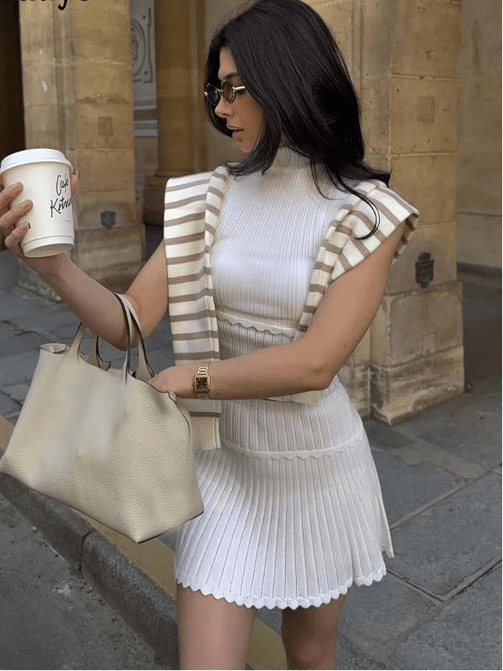 Kelly zweiteiliges Set aus gestricktem Crop-Top und plissiertem Minirock
