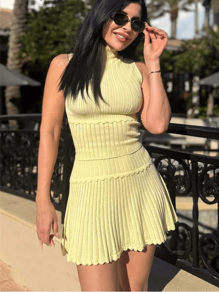Kelly zweiteiliges Set aus gestricktem Crop-Top und plissiertem Minirock