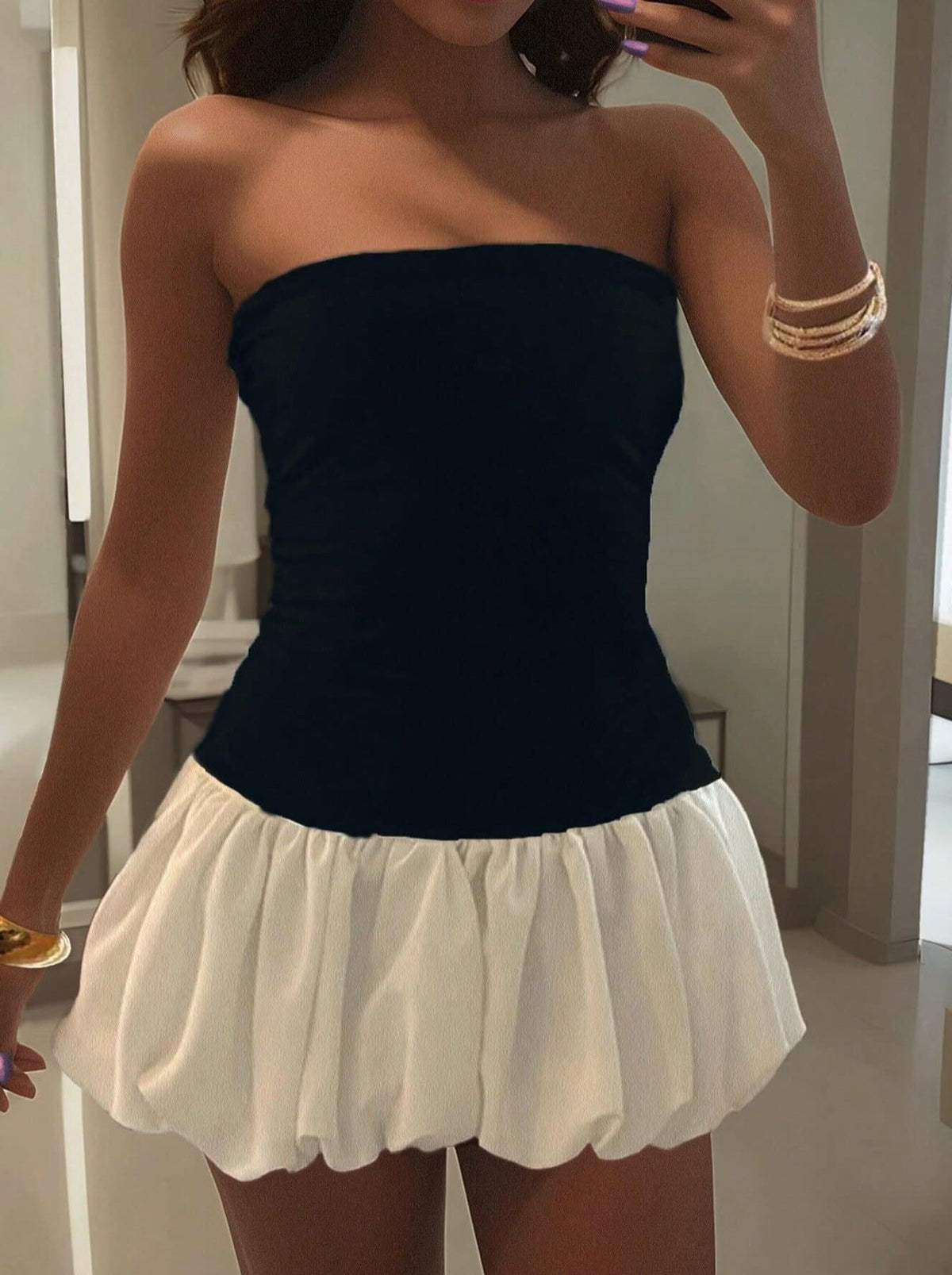 Maurie Kleid mit tiefer Taille und Ballonsaum