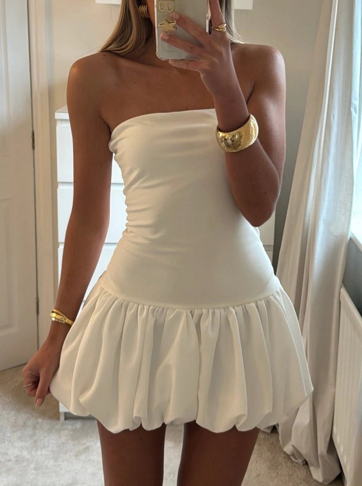 Maurie Kleid mit tiefer Taille und Ballonsaum