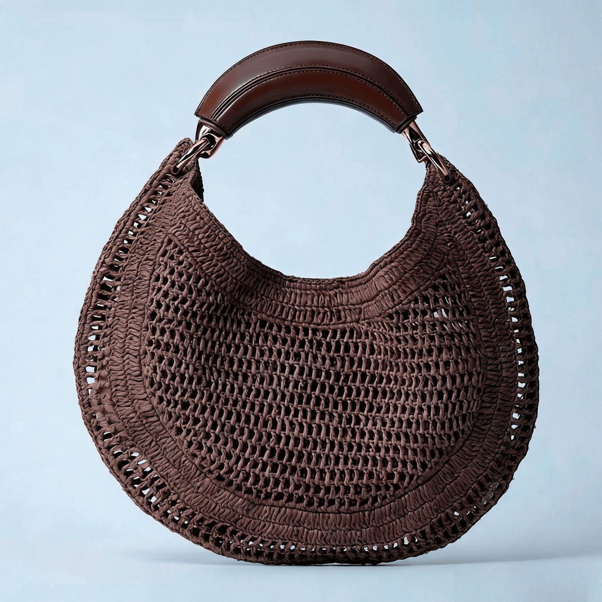 Sabine Halbmondförmige geflochtene Tasche