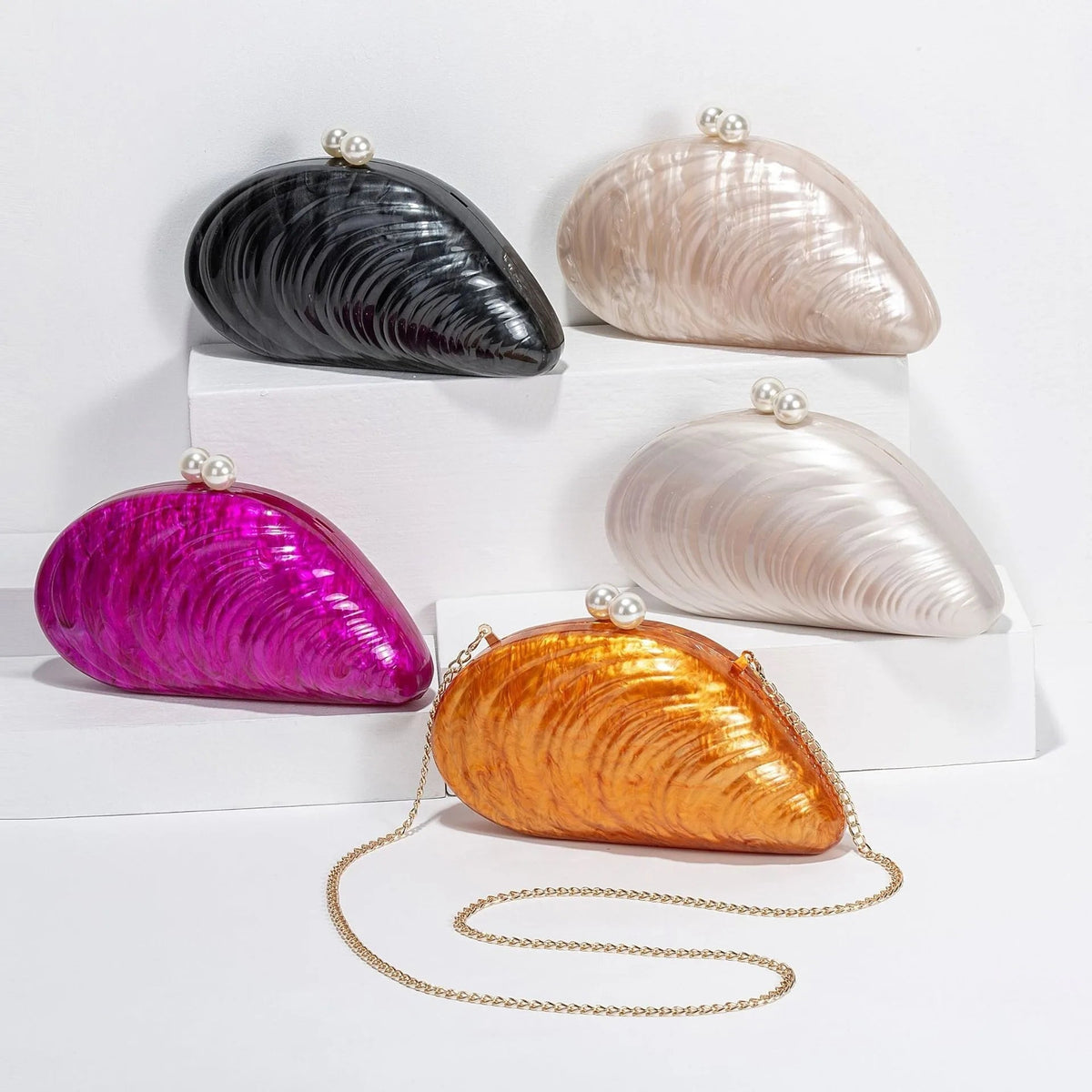 Valentina Clutch mit Muschelform