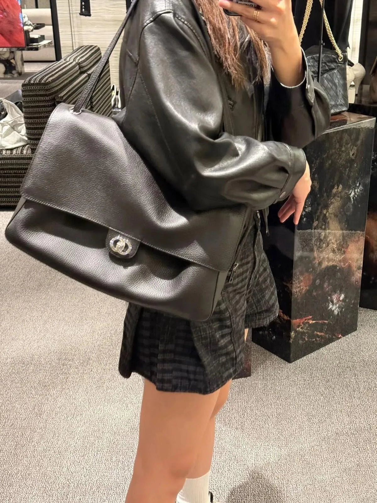 Solveig Buckle Flap Shoulder Bag in black – styled look