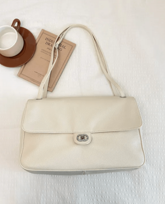 Solveig Buckle Flap Shoulder Bag in white – styled look